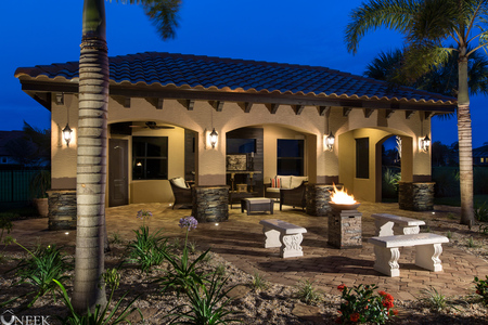 Night shot of 15'x20' Cabana, shows stylish extension of paver deck to the new space.